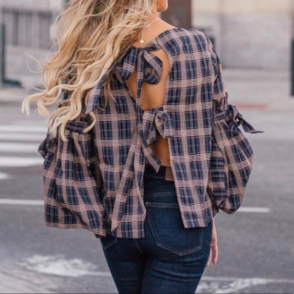 Sugar + Lips blouse with open back and bow detail